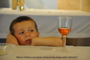 Little Boy dreaming of becoming clergy while stirring at the sacraments